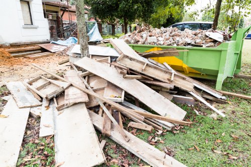 Professional waste clearance service removing construction materials